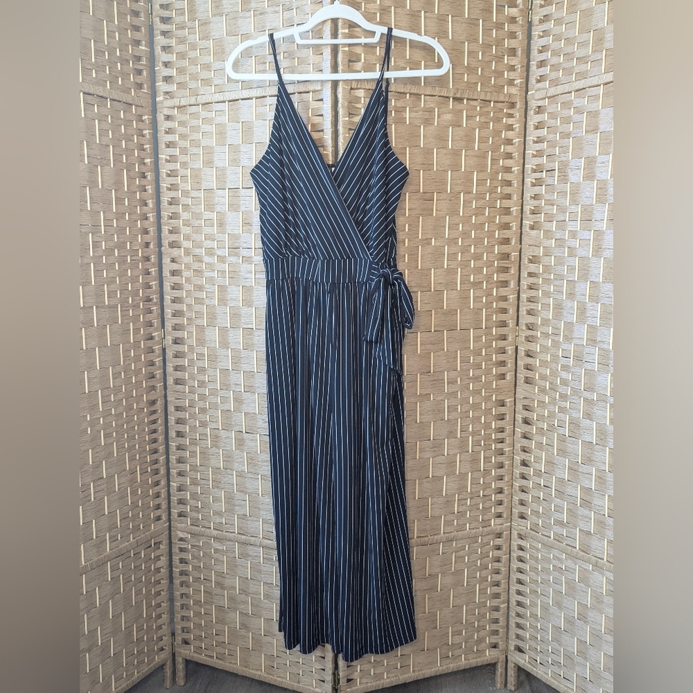 Woman's black with white pinstripe jumpsuit